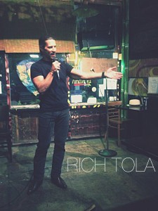 Rich Tola performing at the Tribal Cafe